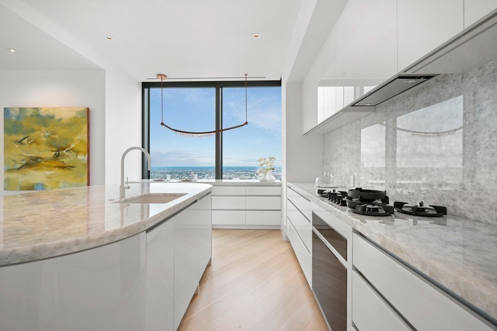 One Dalton Boston Chef Kitchen with White Onyx Island