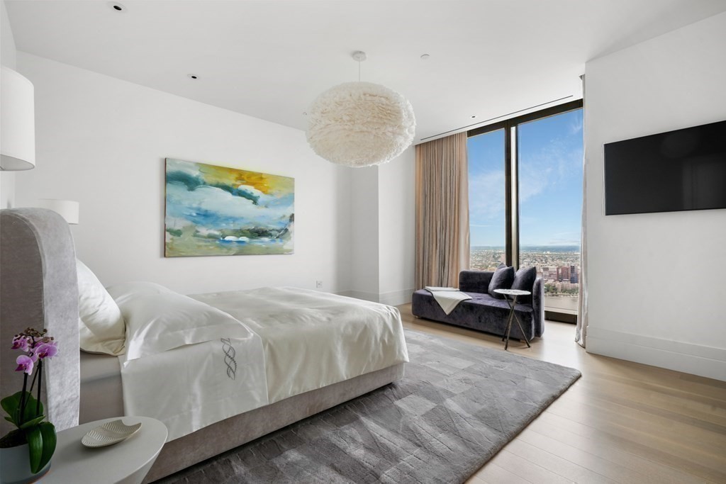 One Dalton Penthouse Primary Bedroom with City Views