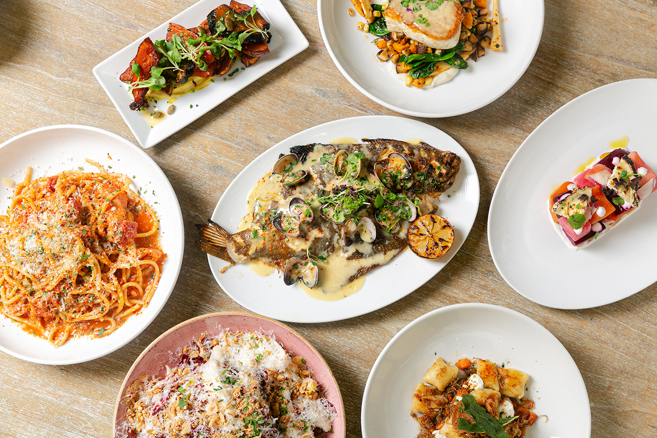Saltie Girl Back Bay Boston best seafood restaurant signature dishes overhead spread